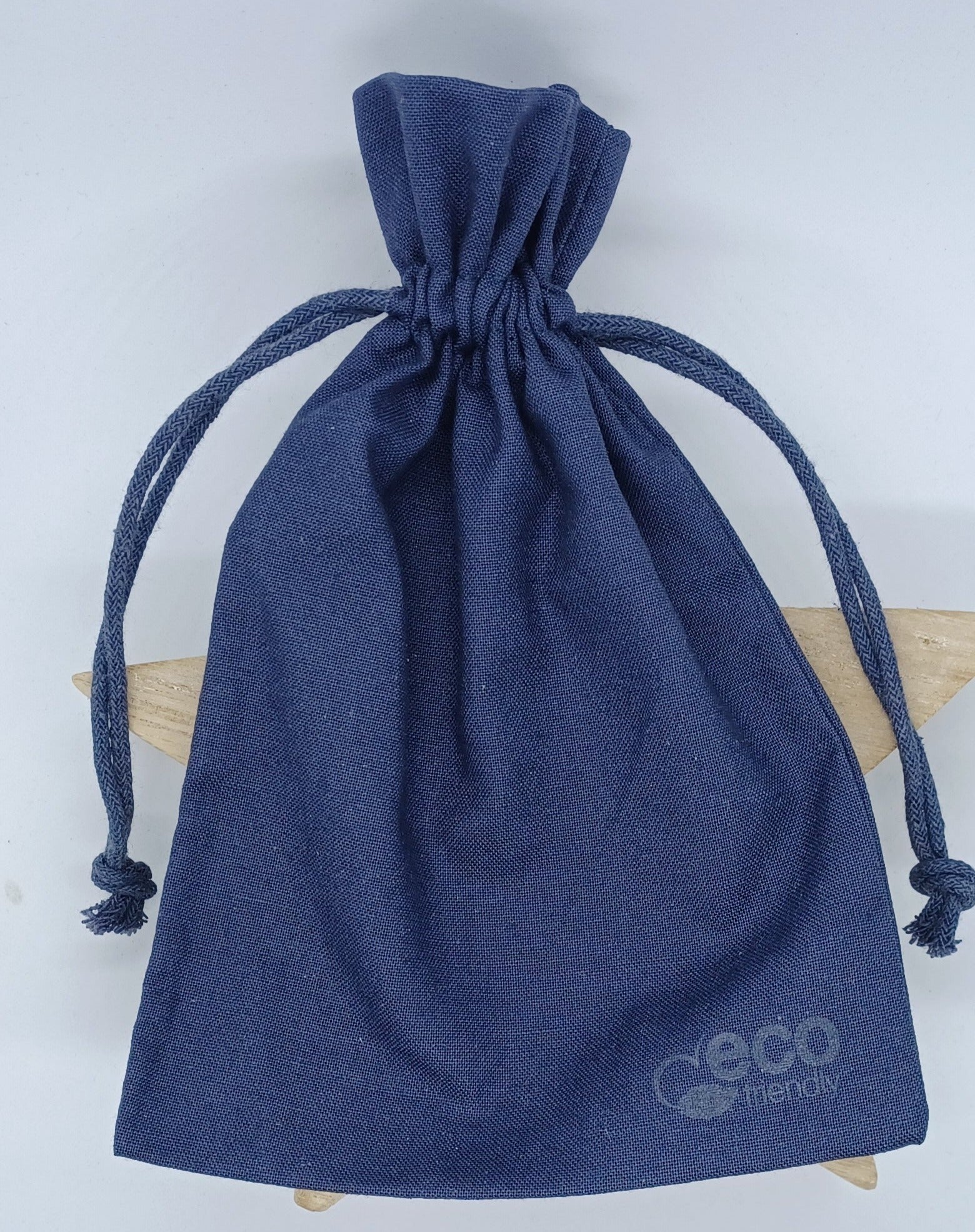 Eco-friendly gift bag. Dark blue in colour with drawstring closure. 