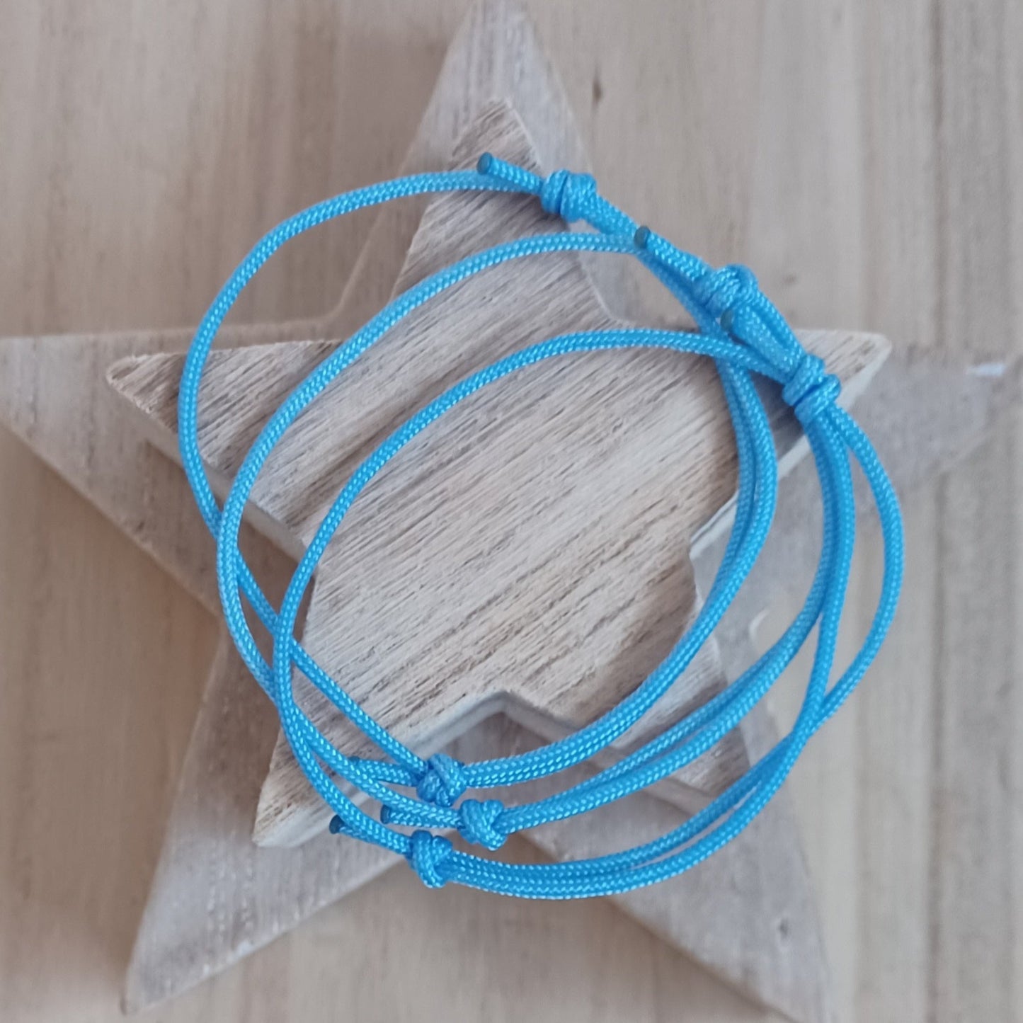 Light blue cord bracelets