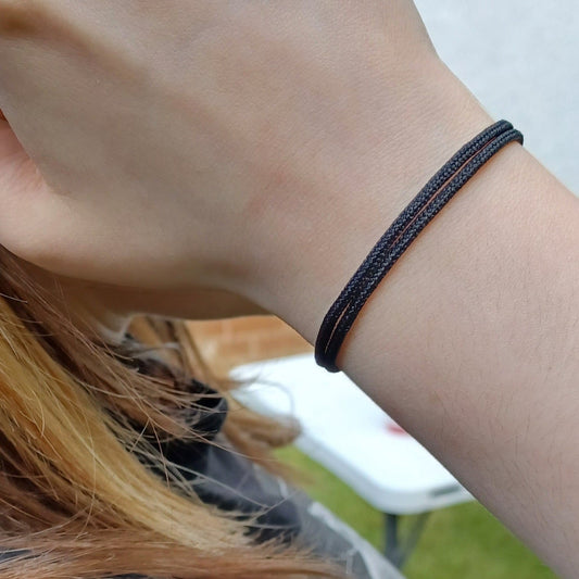 Women's cute black cord bracelet with sliding knots