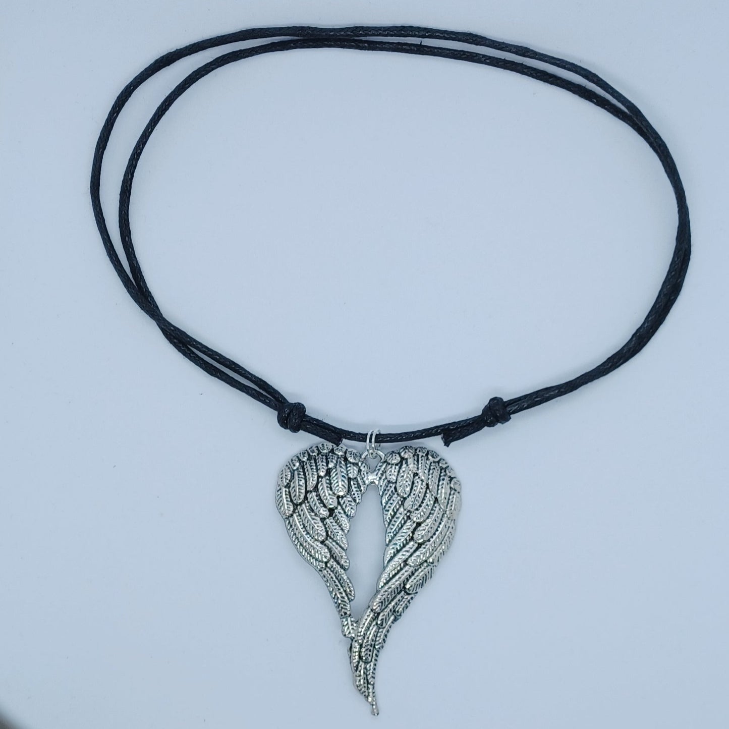 Silver angel wings heart necklace